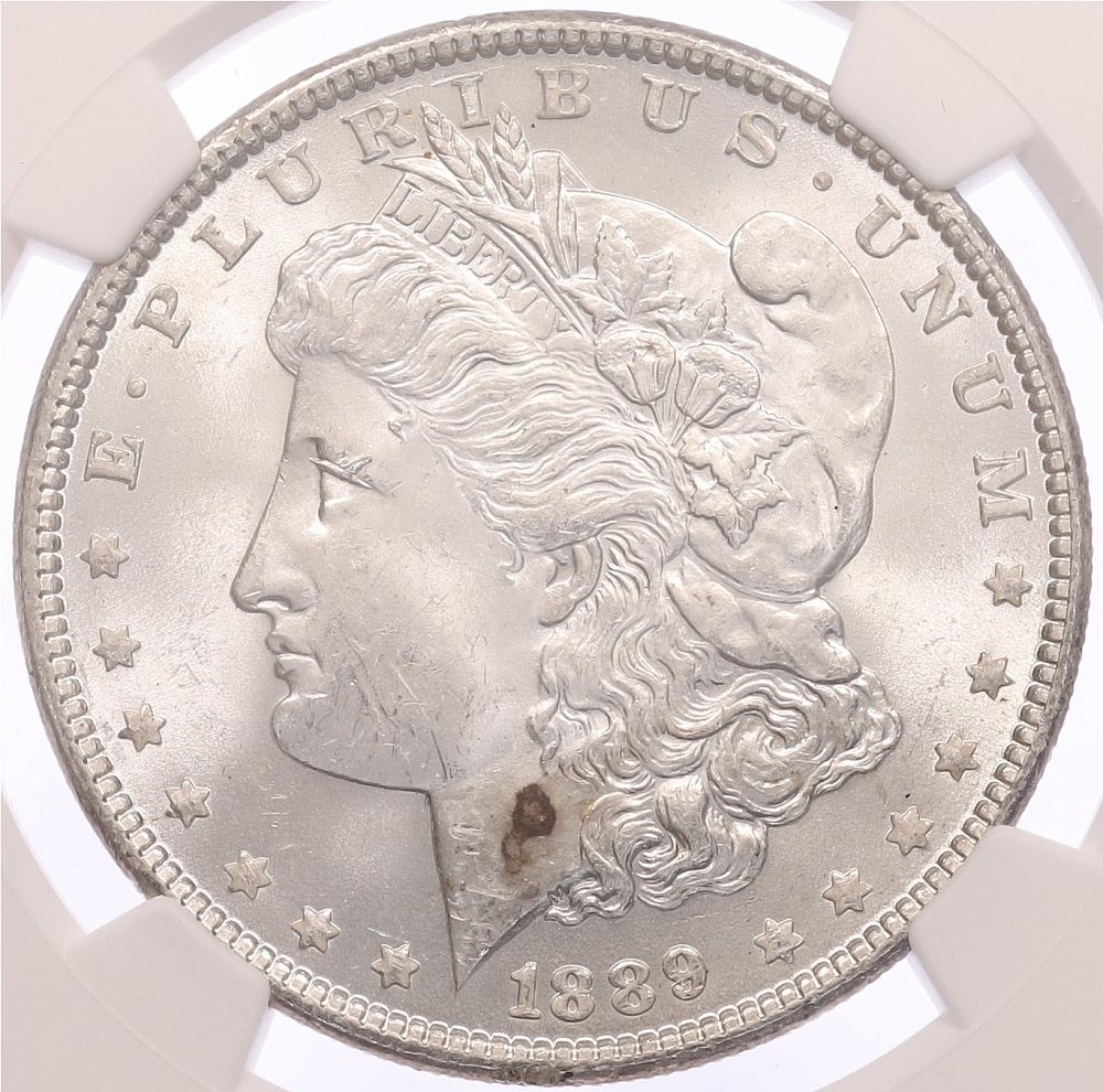 1 доллар 1889 года США «Доллар Моргана» в слабе NGC (MS63) — Фото №1